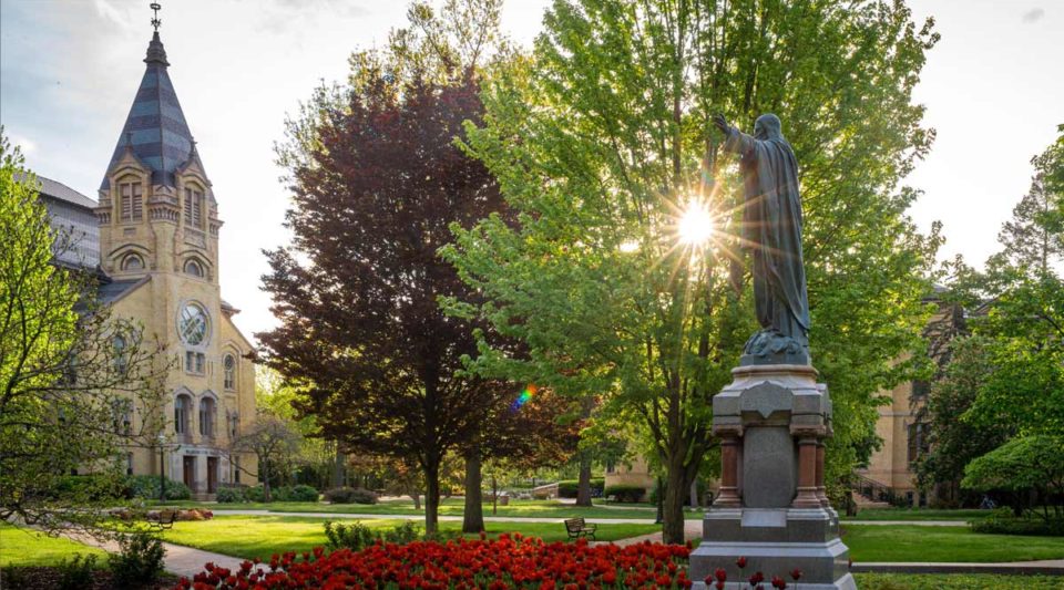 Sacred Heart Jesus statue and Washington Hall