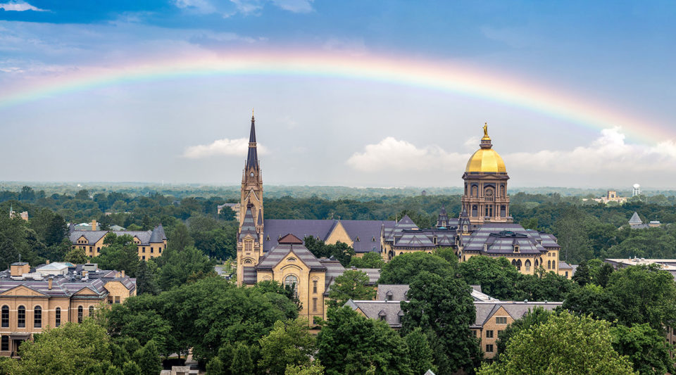 Rainbow over the Basilica and the Golden Dome (Main Building) on campus